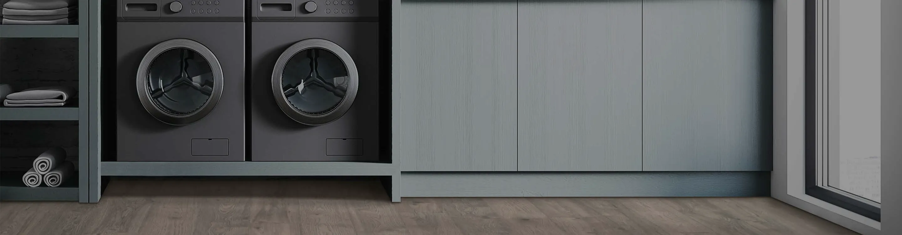 Laminate flooring in a laundry room with built-in shelving
