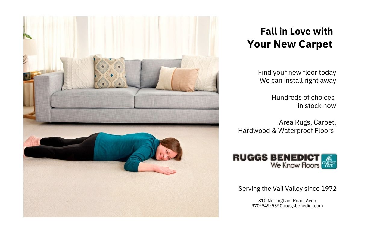 Woman laying on her newly installed carpet.