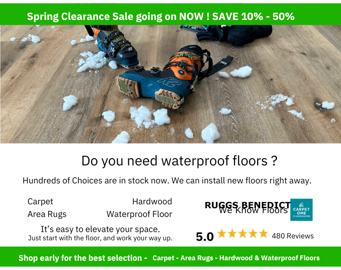 ski boot with snow on waterproof flooring