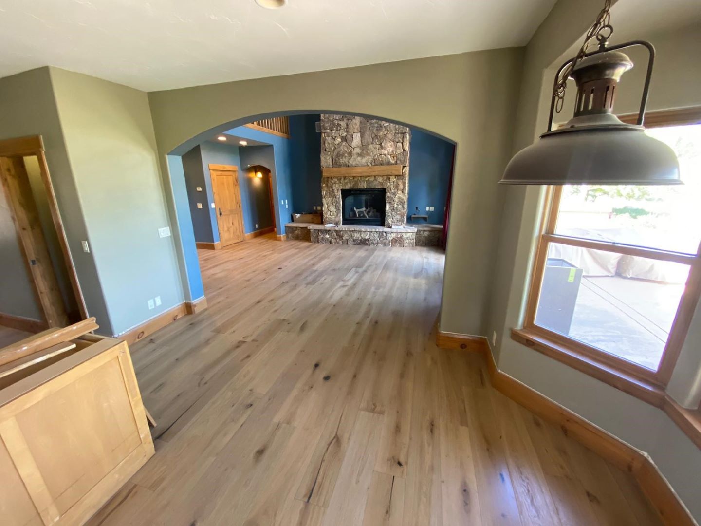 Hardwood flooring and custom fireplace