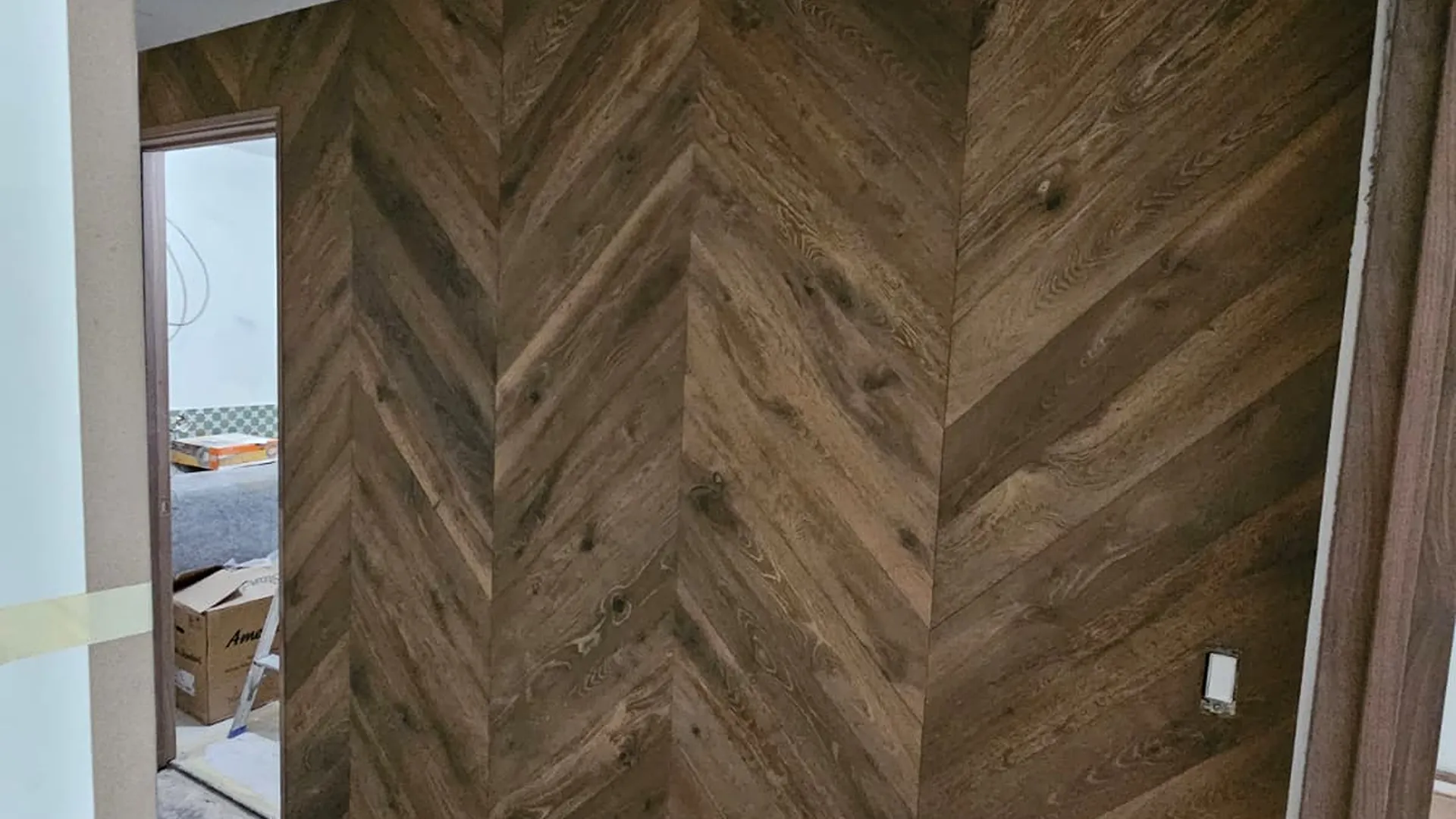 Chevron hardwood wall plank installation in Beaver Creek 