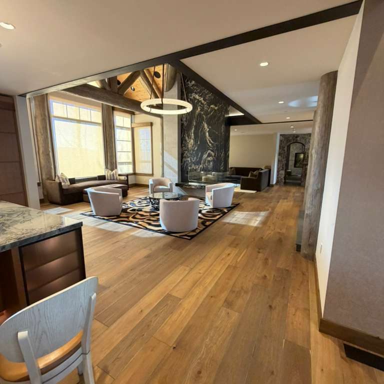 A second living room area with premium hardwood floors from Ruggs Benedict Carpet One.