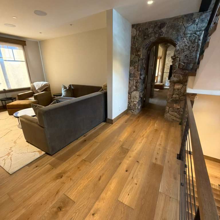 Hallway of a hardwood floor in a Colorado mountain home.