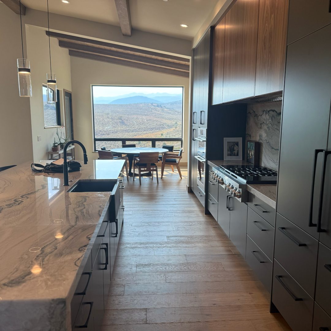 Kitchen area with full hardwood in a Colorado mountain home.