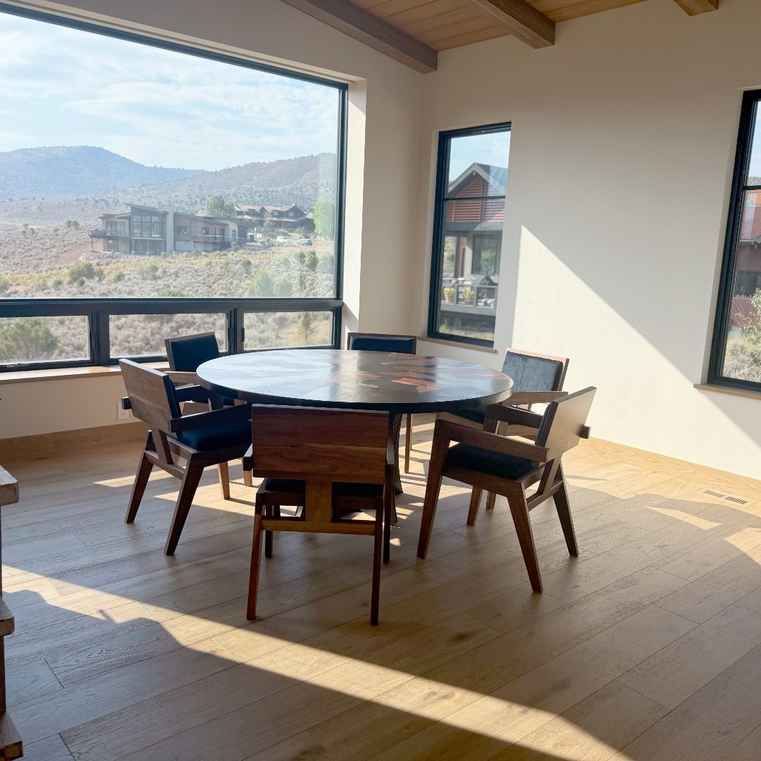 Dining area with hardwood floors.