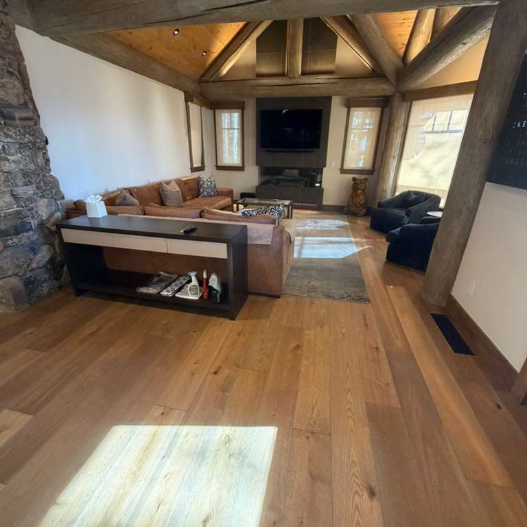 Living room area with hardwood floors.