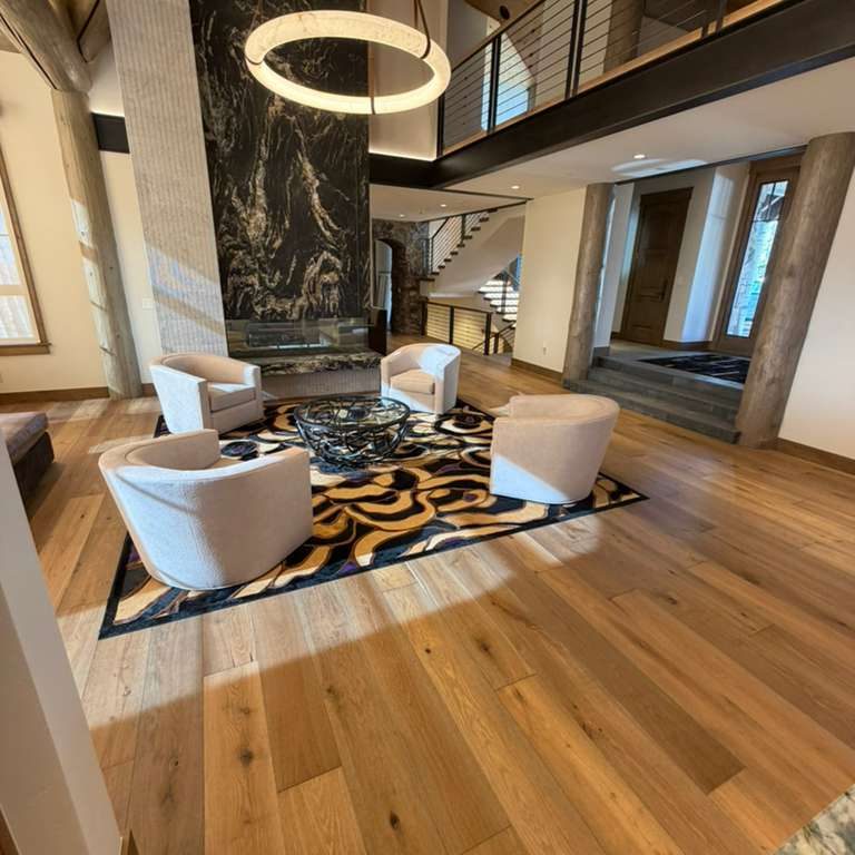 Living space with full hardwood floors.