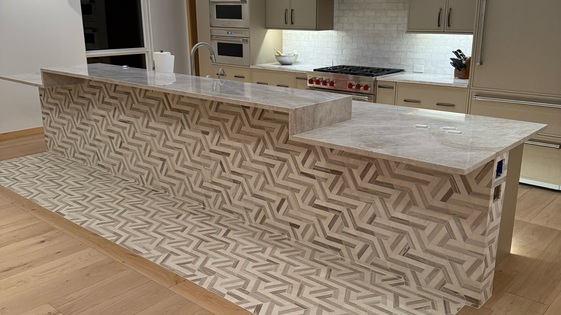 Premium hardwood flooring in a luxury Eagle County kitchen with panoramic mountain views